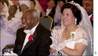 Zambian Archbishop Emmanuel Milingo and his bride at mass wedding in May